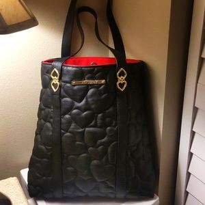 Betsy Johnson large black Tote. EUC!👍 $ discount shipping, that should do.